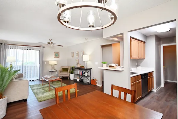 Living room and kitchen interior at Woodspring Apartments