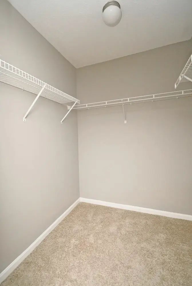 Large walk-in closet with rack shelving